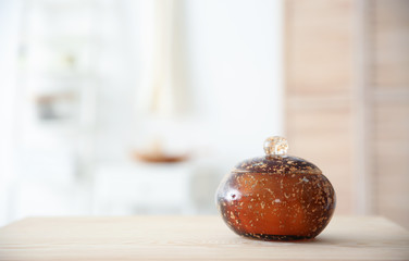 Small decorative box and blurred bathroom on background