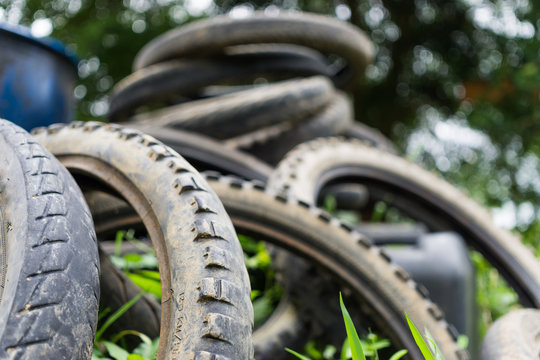 Old tires are discarded as waste problem of the community.