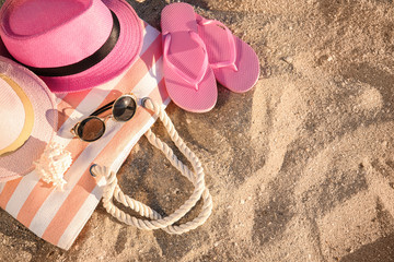 Beach objects and space for text on sand, above view