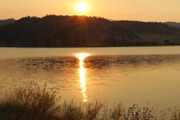 Sunrise reflecting Montana Mountains 