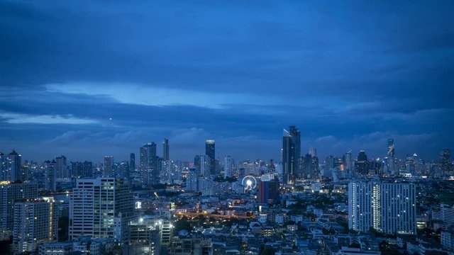 Timelapse of Bangkok city sunset with clouds movement and city light