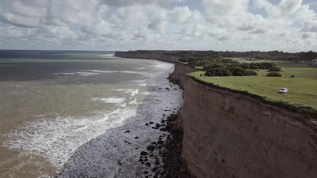 Cliffs at Acantilados near Mar del Plata Argentina – 4k drone video of the Argentinian coast Mar del Plata Casino Central in spring.  Buenos Aires Capital Federal district  