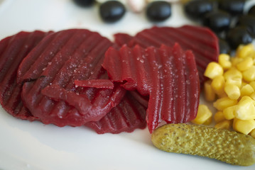 Beetroots, corn, pickles and olive