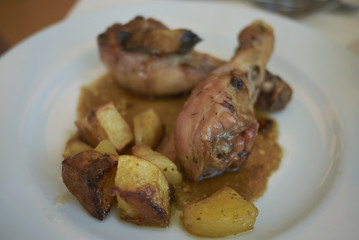 Chicken legs and roasted potatoes