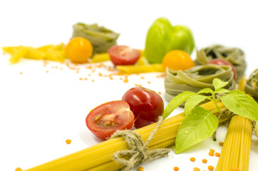 Obraz na płótnie Canvas Pasta, spaghetti, tomatoes, basil are on a white background