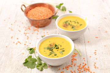 bowl of lentils soup and coriander