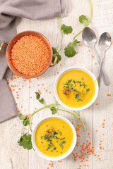 bowl of lentils soup and coriander