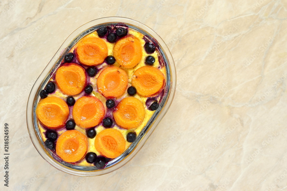 Wall mural Cottage cheese casserole with apricots and black currant