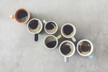 Türaufkleber Many cups of coffee on table © sebra