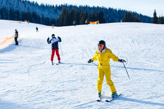 Skiing, winter, ski lesson - skiers on ski run