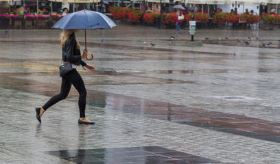 Women with Umbrellas