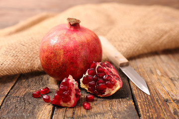 pomegranate on wood background