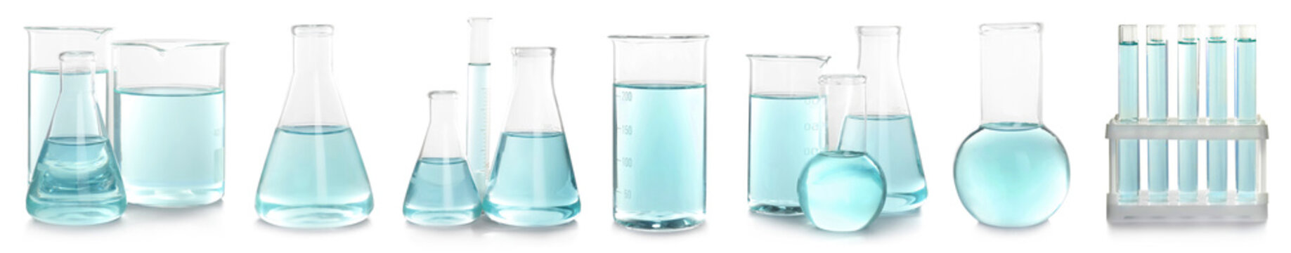 Set with laboratory glassware for chemical analysis on white background