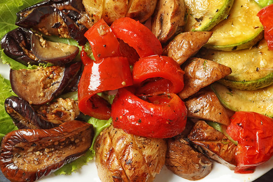 Tasty grilled vegetables on plate, closeup
