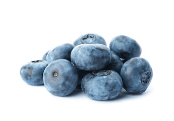 Tasty juicy ripe blueberries on white background
