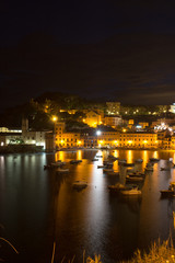 Romantic Time at The Bay of Sestri Levante at the Blue Hour in Summer With Boats Moored
