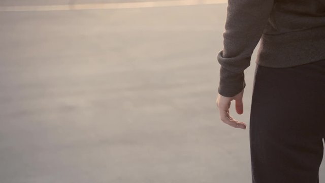 Hip hop female dancer makes experimental moves with her hands and fingers 