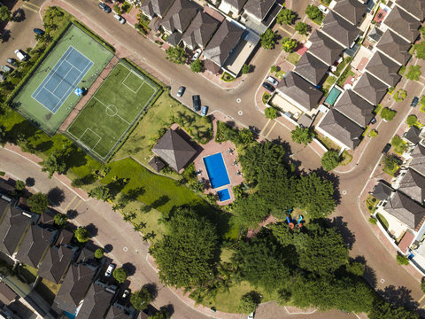 An aerial view of houses of a gated community un Guayaquil, Ecuador. Shot with a drone in a sunny day.