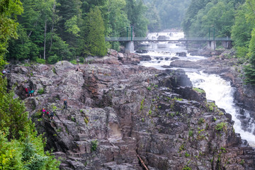QUEBEC CITY, QUEBEC / CANADA - JULY 14 2018: Canyon Ste-Anne at rainy day