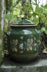 Clay pot for meat dishes, soup, beans. Colorful earthenware pot for cooking.