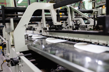 Machinery and printing processes in a modern printing house.