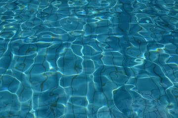 reflections of the water in the pool
