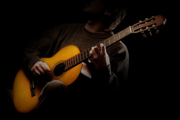 Acoustic guitar player. Classical guitarist