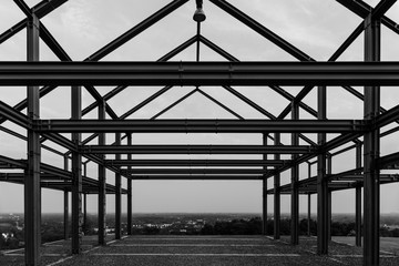 Black and white shot of industrial steel frame construction