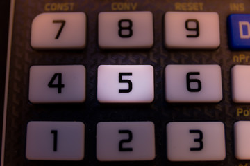 Key number five of the keyboard of a scientific calculator