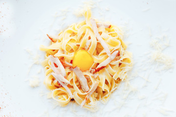 Traditional italian pasta, spaghetti carbonara with bacon, creamy sauce, parmesan cheese