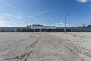 Large empty storefront and empty parking lot