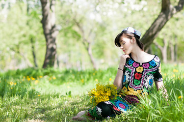 Girl, woman in national historic Tajik costume. Central Asia