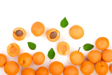 Apricot fruits with leaves isolated on white background with copy space for your text. Top view. Flat lay pattern