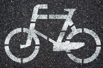 Bicycle sign on the asphalt bicycle lane