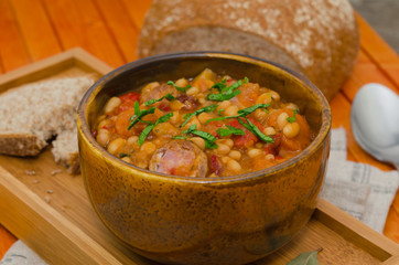 Cassoulet. Baked beans and sausages. Sausage cassoulet 
