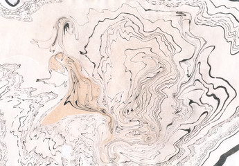 Black and ochre marble texture.