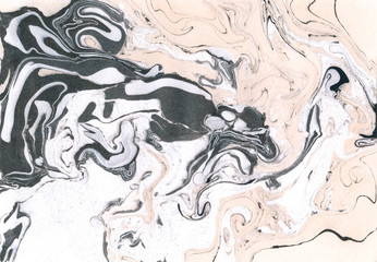 Black and ochre marble texture.