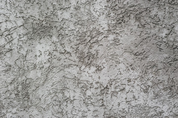 rough gray cement wall with stains for background