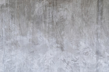 gray cement wall with stains