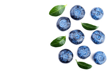 fresh ripe blueberry with leaf isolated on white background with copy space for your text. Top view. Flat lay pattern