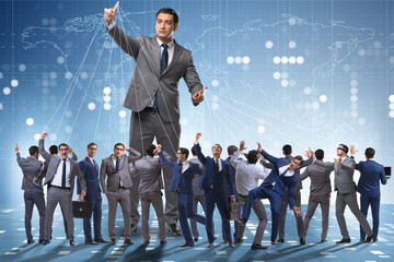 Boss employee manipulating his staff in business concept