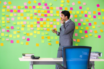 Businessman with many conflicting priorities   