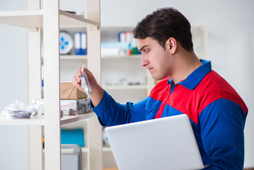 Man working in the postal warehouse