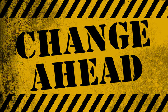 Change ahead sign yellow with stripes