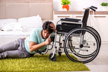 Young handsome disabled man recovering at home 