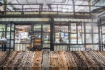 old wood table with blur cafe backgorund