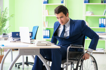 Disabled businessman working in the office