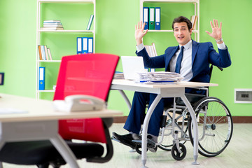 Disabled businessman working in the office