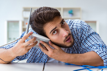 Frustrated young man due to weak internet reception