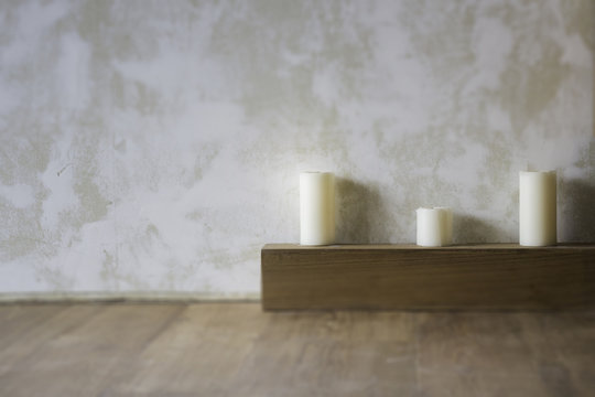 Relaxation aroma candles decorated on wooden floor